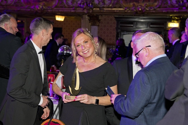 Louise shows off our brand-new trophy!