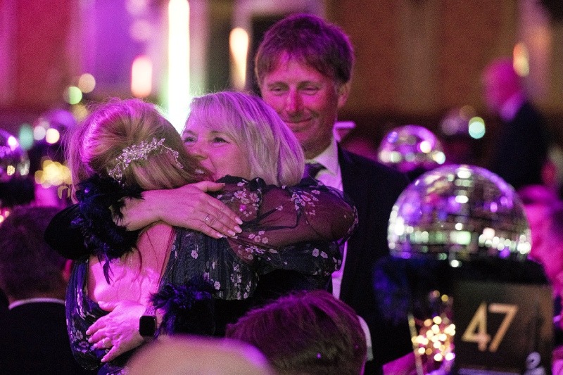 A celebratory hug for the winners!