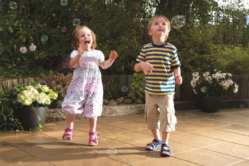 Children Blowing Bubbles in the Garden Children Blowing Bubbles in the Garden